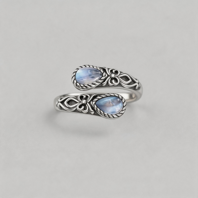 TWIN MOONBEAMS. Baroque Engraved Dual Pear-Cut Opal Ring - Silver